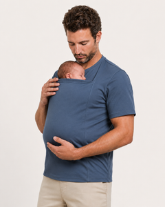 The Close Tee in Blue, worn with a baby in the kangaroo pouch